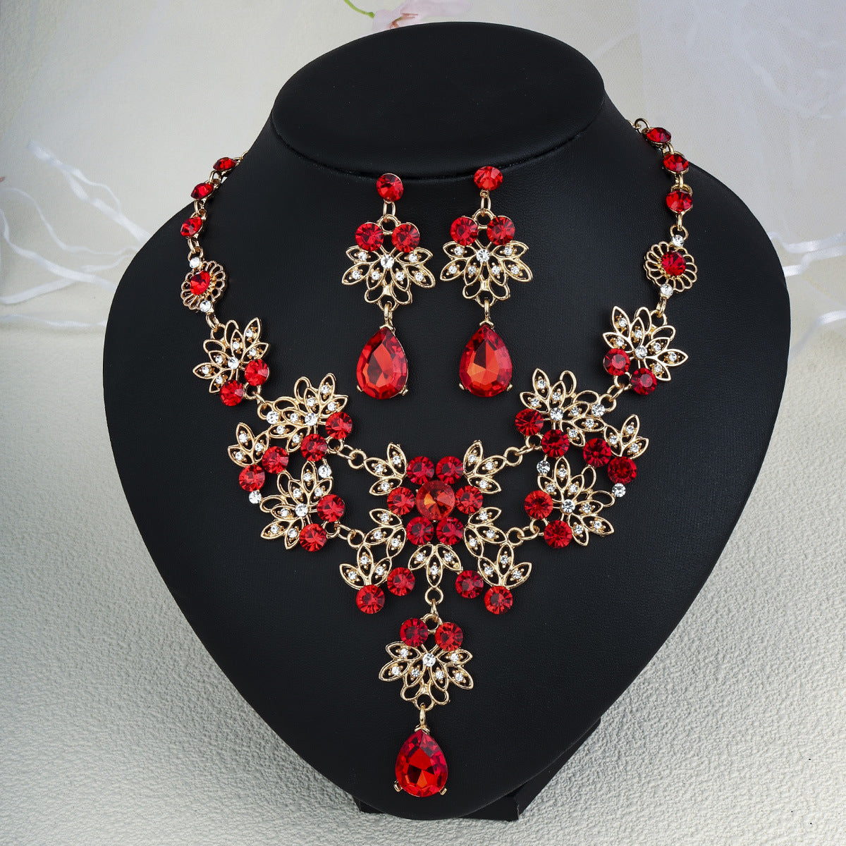 Rhinestone jewelry set: earrings and necklace.