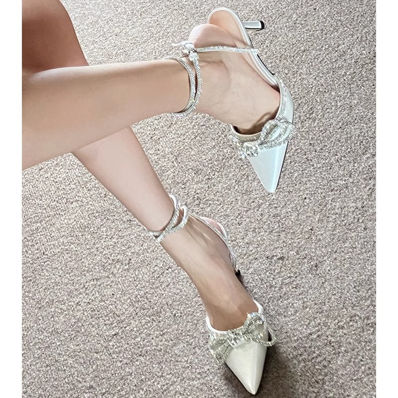 Pointed-toe mid-heel womens sandals with cross-buckle and rhinestone bow strap