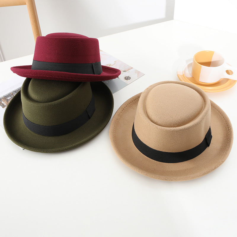 Black ribbon top hat, curved brim jazz hat.