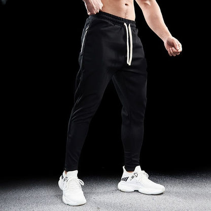 Slim-fit men's stretch running pants with zip pockets