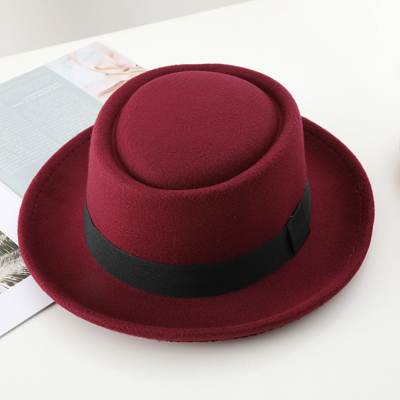 Black ribbon top hat, curved brim jazz hat.