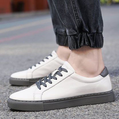 Plus size men's white low-top leather sneakers. Sporty and casual