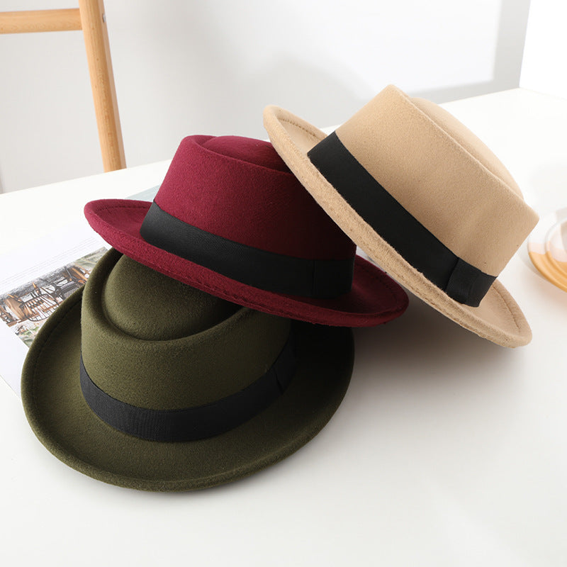 Black ribbon top hat, curved brim jazz hat.