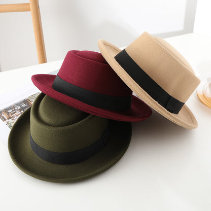 Black ribbon top hat, curved brim jazz hat.