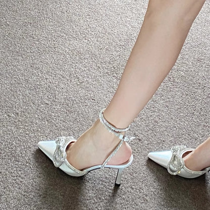 Pointed-toe mid-heel womens sandals with cross-buckle and rhinestone bow strap