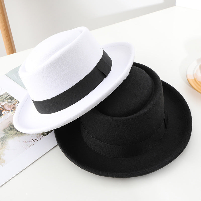 Black ribbon top hat, curved brim jazz hat.